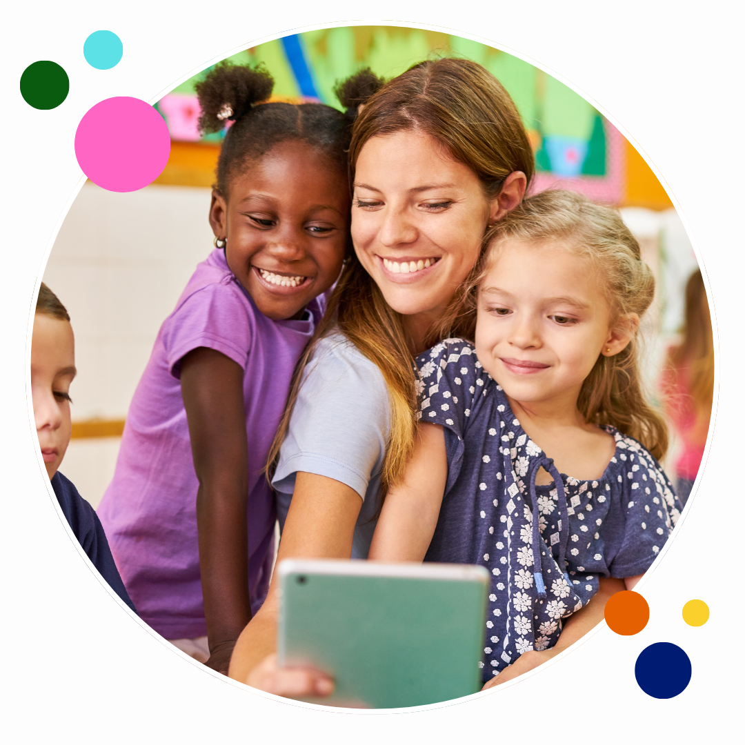 childcare teacher with students smiling