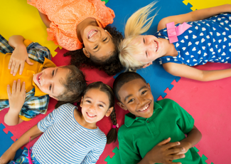 smiling students in a circle