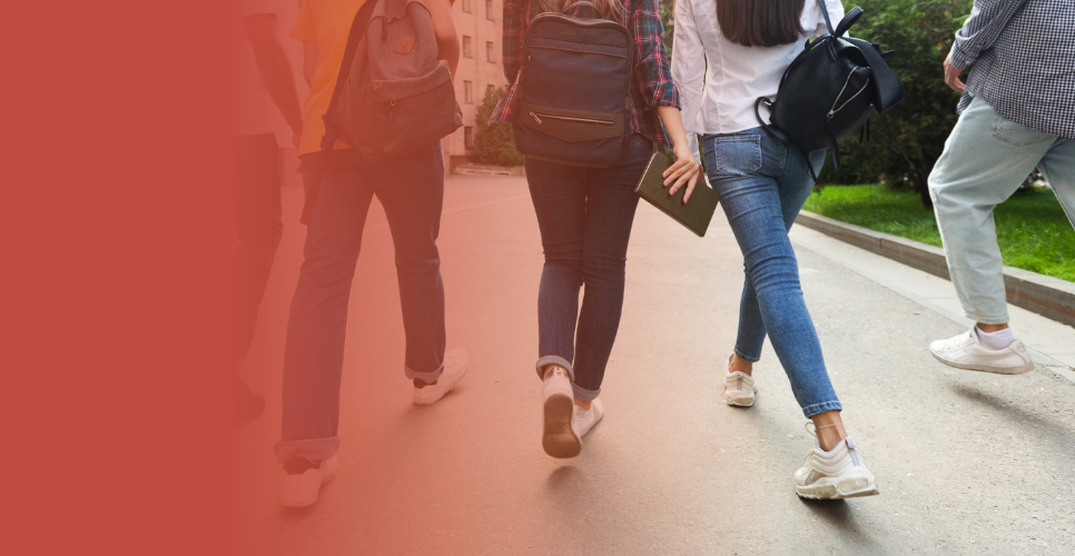 Secondary students walking into school