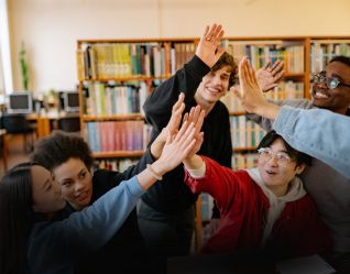 Students high fiving